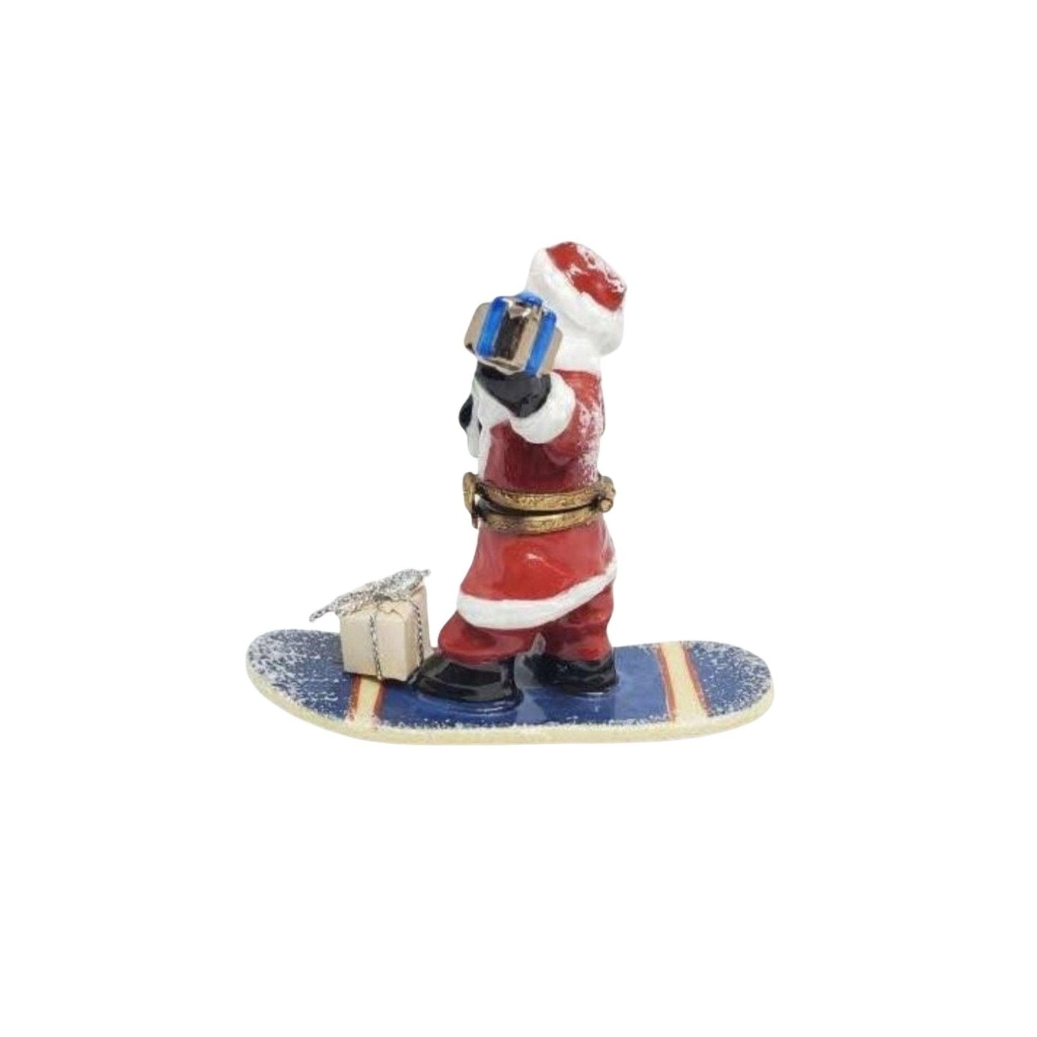 Santa Claus On Purple Snow Board Limoges Box Porcelain Figurine